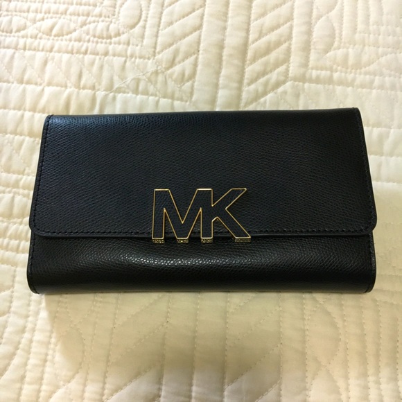 Michael Kors Handbags - Rare Michael Kors Trifold Large Wallet